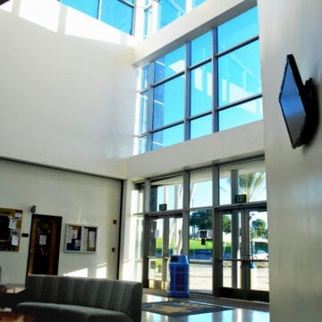 The Student Center is an innovative high-performance building with optimum functionality and maximum flexibility. The 2-story structure is part of a five building project which includes a Maintenance and Operations Center, Sports Stadium, Field House, Campus Security building, and 500 car Parking Structure.