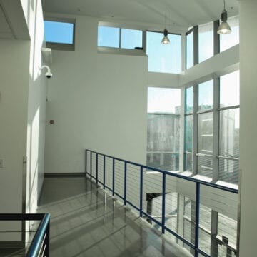 The Student Center is an innovative high-performance building with optimum functionality and maximum flexibility. The 2-story structure is part of a five building project which includes a Maintenance and Operations Center, Sports Stadium, Field House, Campus Security building, and 500 car Parking Structure.