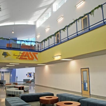 The Student Center is an innovative high-performance building with optimum functionality and maximum flexibility. The 2-story structure is part of a five building project which includes a Maintenance and Operations Center, Sports Stadium, Field House, Campus Security building, and 500 car Parking Structure.